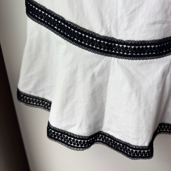 ALICE + OLIVIA | REVOLVE SAKS RAPUNZEL FLOUNCE MINI DRESS WHITE CROCHET ACCENT - Picture 5 of 7